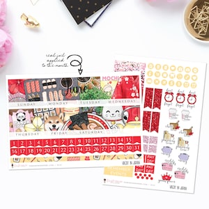 May include: A planner sticker set with a Japanese theme. The set includes a calendar sheet with the month of June, a sheet of stickers with various Japanese-themed illustrations, and a sheet of stickers with icons and text.