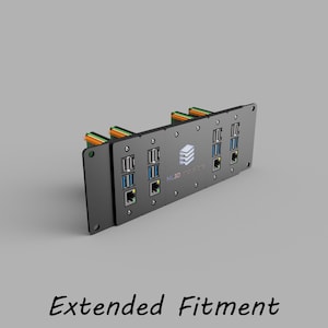 May include: A black electronic component with multiple ports and connectors. The component has a rectangular shape with the text "ML3D Solutions" and "Extended Fitment" on the surface. Various colored wires are visible.