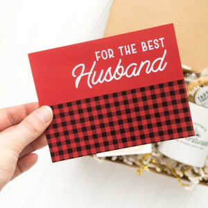 May include: Red and black plaid card with the text "For the Best Husband" in white.