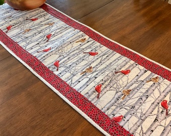 Cardinal pairs table runner with silver trim, table mat with cardinals and birches