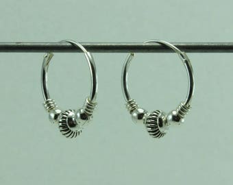 delicate sterling silver hoop earring sold by one,tiny sterling silver loop earring for men,unisex silver hoop,ethnic silver beads hoop