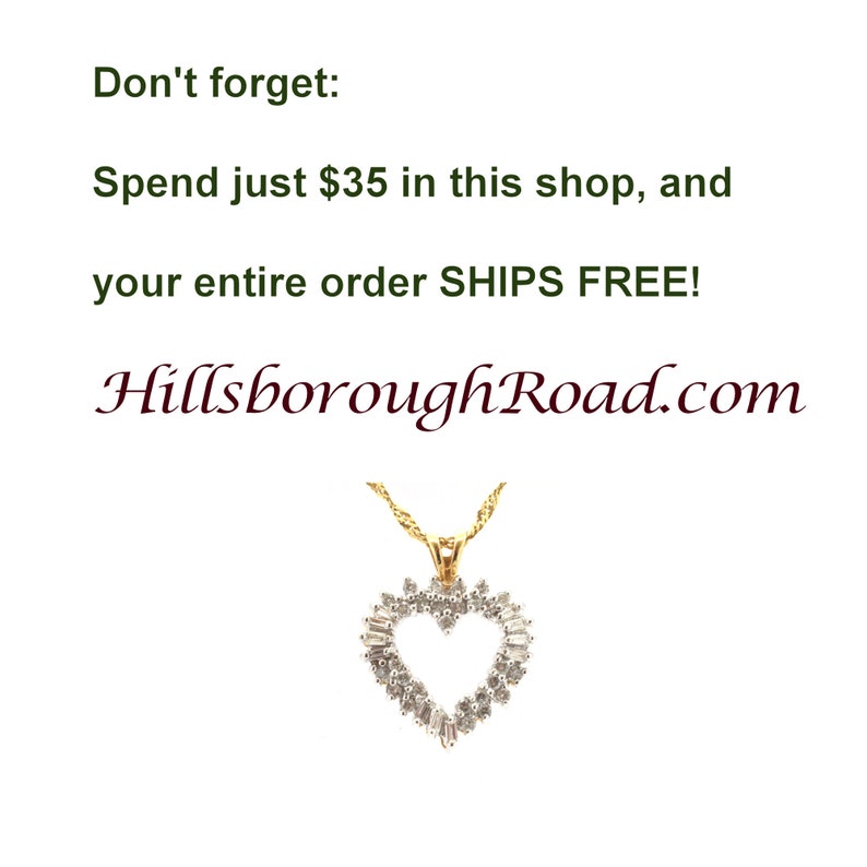 May include: A gold heart-shaped pendant necklace with a diamond-like stone setting. The text "Don't forget: Spend just $35 in this shop, and your entire order SHIPS FREE! HillsboroughRoad.com" is visible in the image.