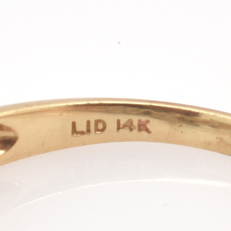 Vintage 14K Gold Oval Diamond Ring with Baguette and Round Accents image 8