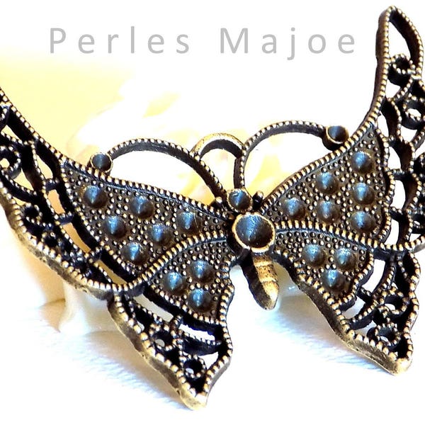 Pendentif forme papillon décoré couleur bronze antique 55x43x2 mm