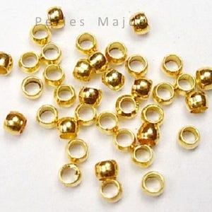 Lot de perles à écraser couleur dorée vendu par 4gr environ 200 unités