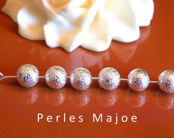 20 perles stardust rondes en laiton couleur argentée 6 mm