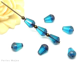 Perle tchèque goutte, verre poli au feu, à facettes, translucide, bleu, patine cuivrée, 8 x 6 mm, lot de 10