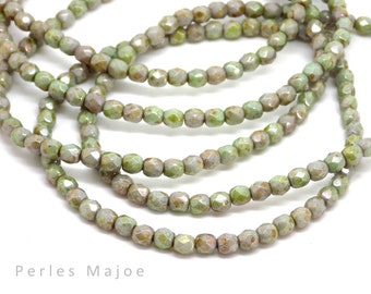 perles tchèques à facettes, ovales, verre pressé, polies et lustrées, divers tons vert, relfet ab, patine,  4 mm, lot de 50