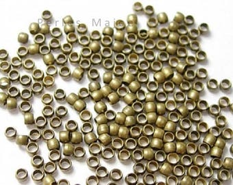 Lot de perles à écraser couleur bronze vendu par 4gr environ 200 unités