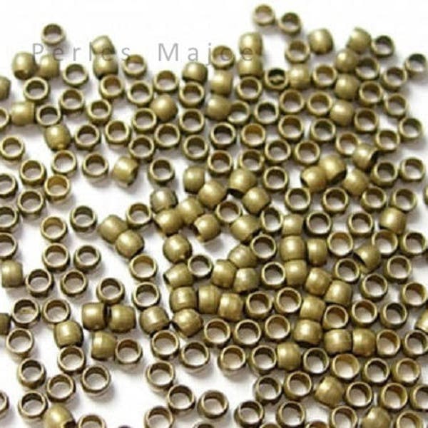 Lot de perles à écraser couleur bronze vendu par 4gr environ 200 unités