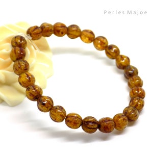 Perles tchèques melons rondes, verre pressé, divers tons ambre, miel, diamètre 6 mm lot de 20 unités