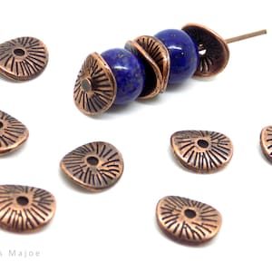 copper-colored decorated twist cups 9 x 10 mm, sold in packs of 6 or 20
