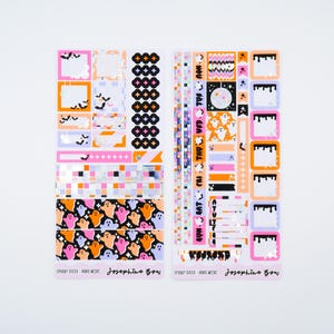 May include: Two sheets of Halloween themed planner stickers with a spooky disco theme. The stickers feature ghosts, bats, and a disco ball. The text on the stickers reads "Spooky Disco - Word Weeks" and "Josephine Bow".