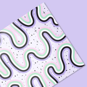 May include: A patterned paper with a repeating design of wavy lines in pastel colors: pink, green, white, and black, on a light purple background. Small black dots and white cross-shaped stars are scattered across the surface.