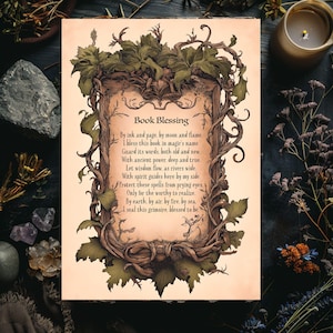 May include: A vintage-style print featuring the text "Book Blessing" surrounded by a detailed frame of intertwined branches and leaves. The text is in a classic font, with a parchment-like background, evoking a mystical or fantasy theme.