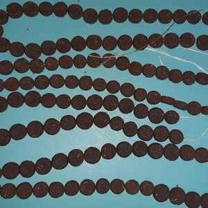 Rhodides (Roman rose petal beads)