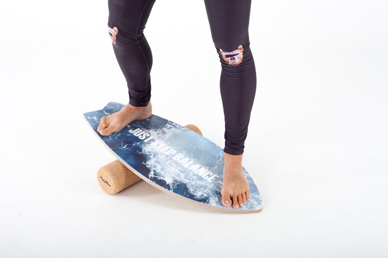 Designed balance board. Excellent item for feeling yourself as a surf boarder at home. Wobble and balance HappyMoon Board + Roll