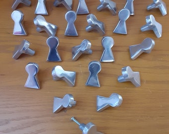 Set of 25-  Aluminum Knobs, Key shape, White Satin silver color.