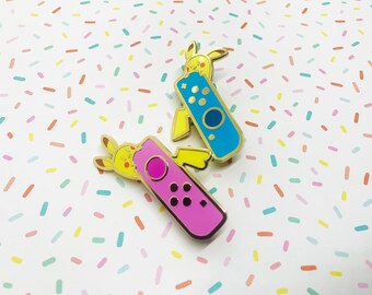 Pink and Blue Game Controllers - Hard Gold Enamel Pin