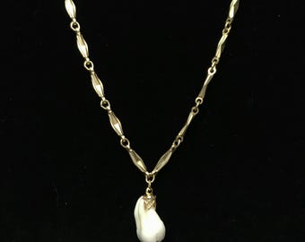 Real human tooth on vintage gold watch fob chain