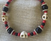 Halloween bracelet Black and red Agate, Onyx Gemstones and white Howlite skulls