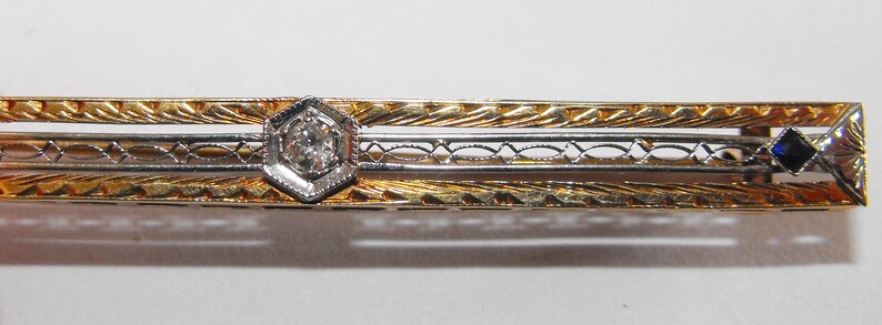 Vintage 14 karat Gold 5.5mm wide. 58mm long Diamond and Sapphire Bar Brooch