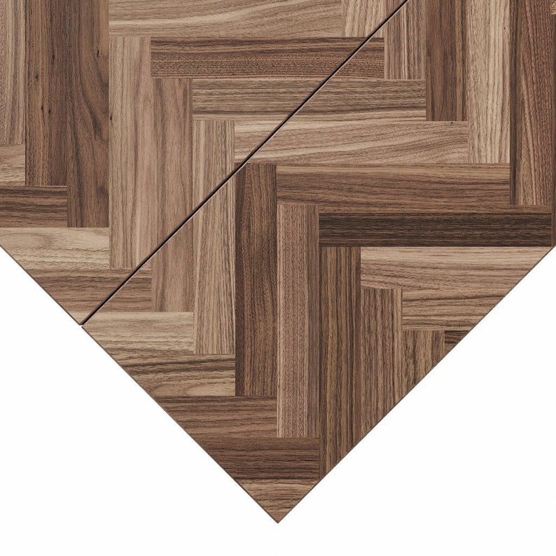 May include: A close-up of a brown wood floor with a herringbone pattern.