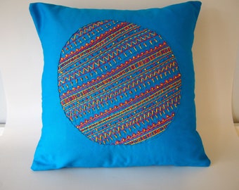 Electric blue hand embroidered cushion