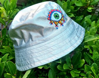 Silver bucket hat with eye motif