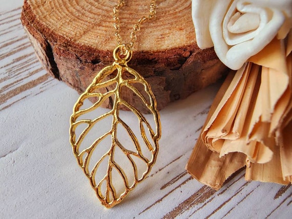 Gold leaf pendant designs discount