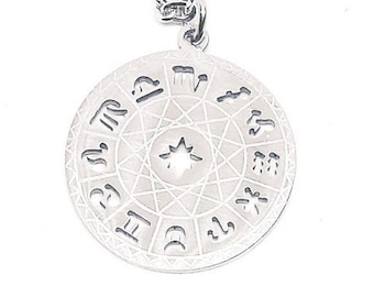 May include: A silver necklace with a round pendant featuring the zodiac signs. The pendant is detailed with a star in the center and a delicate pattern.