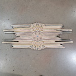 Broken skateboard wall hanging