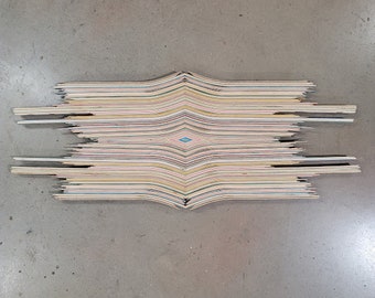 Broken skateboard wall hanging