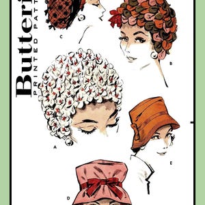 May include: Vintage sewing pattern for five different hats. The pattern is for a head size of 21 1/2 inches. The hats are a variety of styles, including a floral hat, a net hat, a flower-shaped hat, a cloche hat, and a pillbox hat. The pattern is from Butterick and is number 8880.