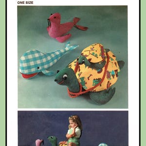 May include: A sewing pattern for making stuffed toys. The pattern includes instructions for making a whale, a seal, and a turtle. The pattern is from Simplicity and is number 5331. The pattern is for one size.