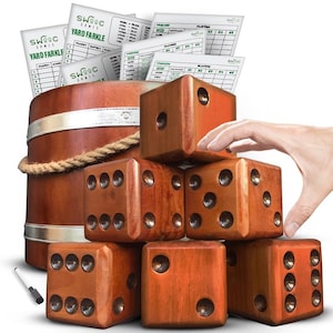 May include: A set of six large wooden dice in a natural brown color, stacked in a pyramid shape. The dice are used for a yard game called "Yard Farkle". A wooden barrel and scorecards are also included in the image.