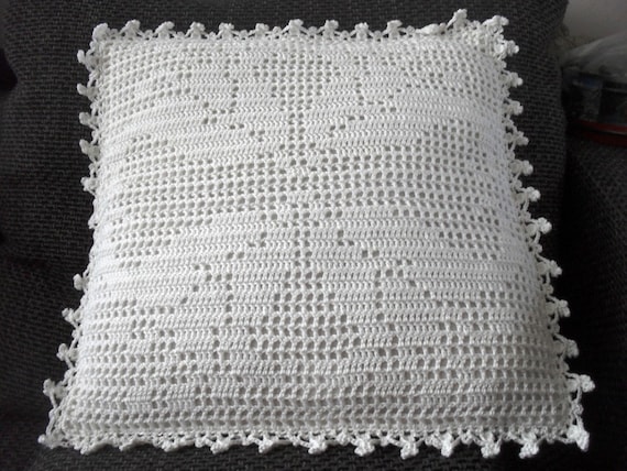 white crochet pillow