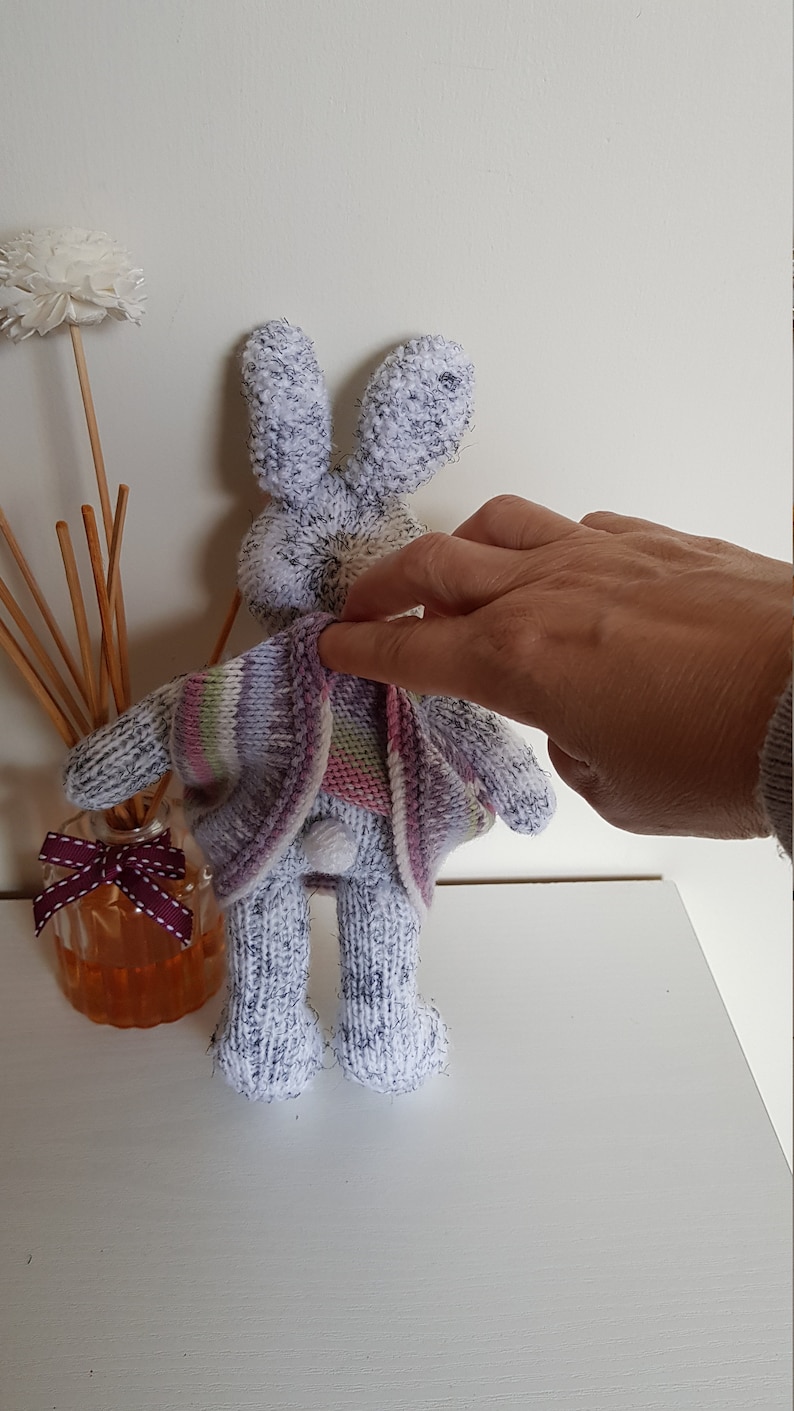Harriet is eagerly awaiting adoption and can/'t wait to meet her new family Hand knitted bunny Multicolored dress Nursery prop.