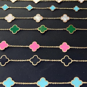 REAL 14K Gold Enamel Clover Bracelets.  2 grams for pink size                                    1.6 grams green size in first picture