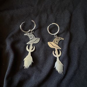 Stainless steel witch hat on broom earrings