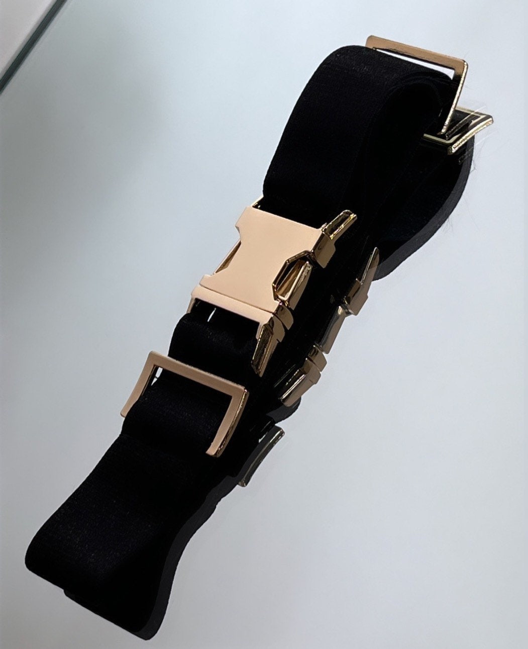 Black metallic choker with gold body harness chain