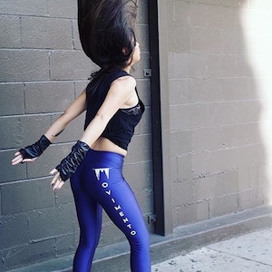 MOVIMENTO-Apparel poly/nylon high waisted Navallogo dancer legging. Made in Los Angeles. Ready to ship image 1