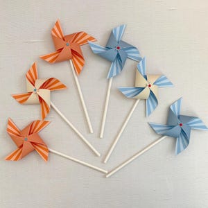 Starburst coral and blue pinwheels: Carnival, circus or fair birthday party décor