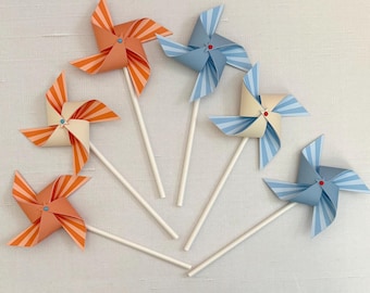 Starburst coral and blue pinwheels: Carnival, circus or fair birthday party décor