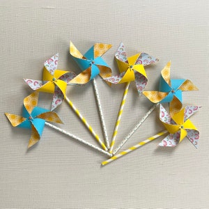 Sunshine and rainbows pinwheels | First trip around the sun | You are my sunshine pinwheels | Happy rainbows pinwheels