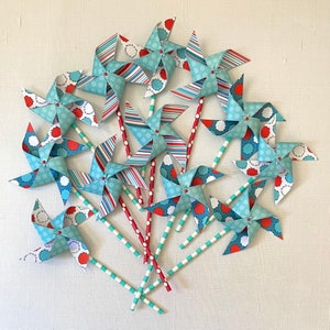 Wild and wacky spinning pinwheels | Spinning paper pinwheels for party favors | Turquoise and red pinwheels