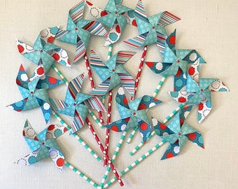 Wild and wacky spinning pinwheels | Spinning paper pinwheels for party favors | Turquoise and red pinwheels