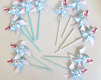 Paper plane theme pinwheels | Time flies theme pinwheels | Red and blue pinwheels