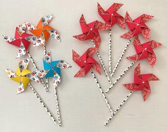 Paw prints doggie bones spinning paper pinwheels for party favors