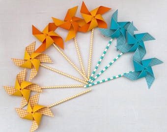 Yellow, teal, orange and yellow pinwheels | First trip around the sun | Sunshine birthday party | Beach party pinwheels